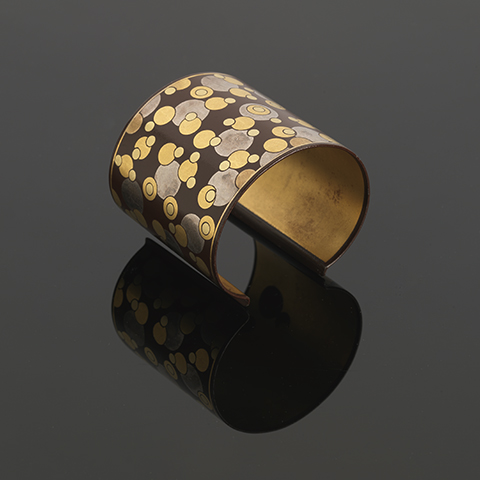 Cummings - Iron cuff bangle inlaid with 18ct yellow and white gold